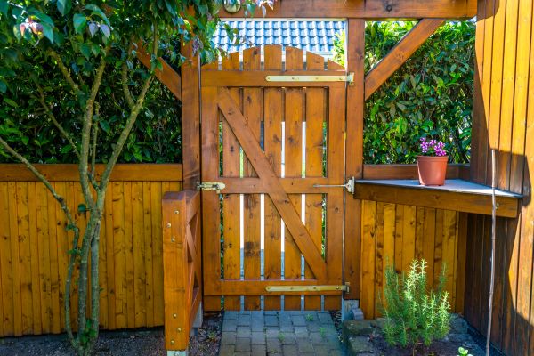 Wood Gate Repair in Brick