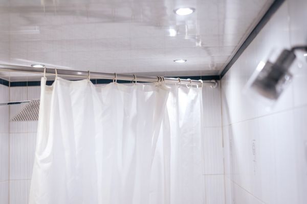 Shower Rod Installation in Brick