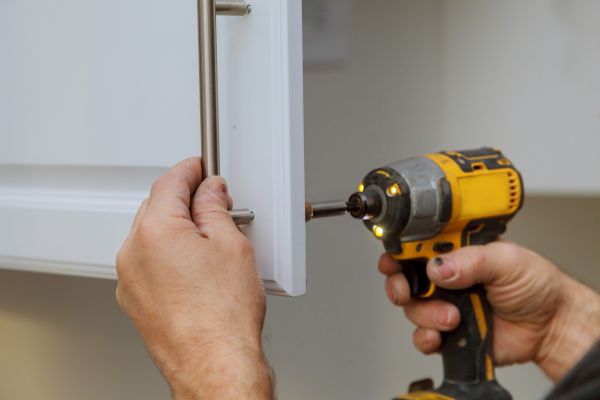 Cabinet Knob Installation in Brick