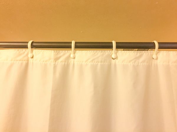 Shower Curtain Hanging in Brick