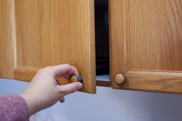 Cupboard Knob Installation in Brick