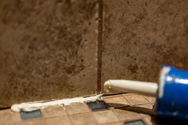 Shower Caulk Replacement in Brick
