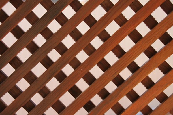 Wood Lattice Repair in Brick